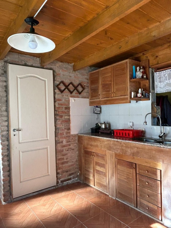 Cabaña con ampliacion sobre amplio lote de 1.530 m² en Punta Indio